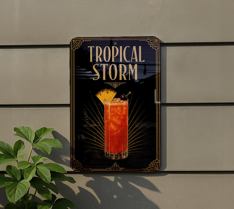 A sign for a tropical storm cocktail is displayed on a wall, with a plant visible to the left.
