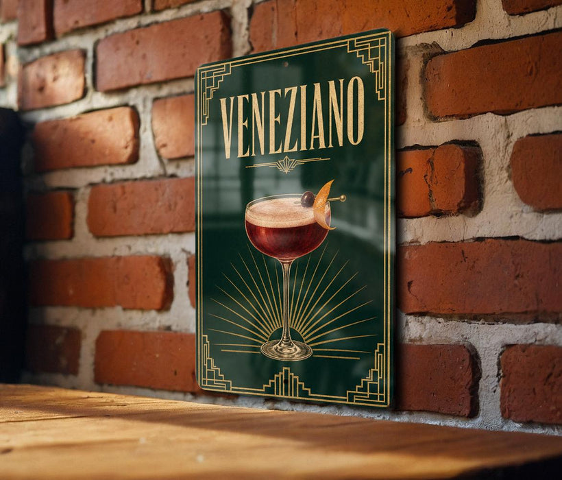 A sign for Veneziano cocktail is displayed on a brick wall, featuring an illustration of a Veneziano drink with a garnish.