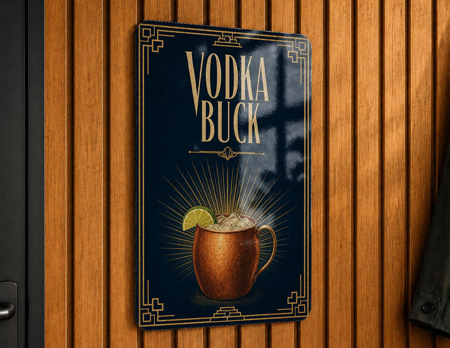 A sign for "Vodka Buck", featuring an illustration of a copper mug with a lime slice, against a dark blue background with a decorative border.