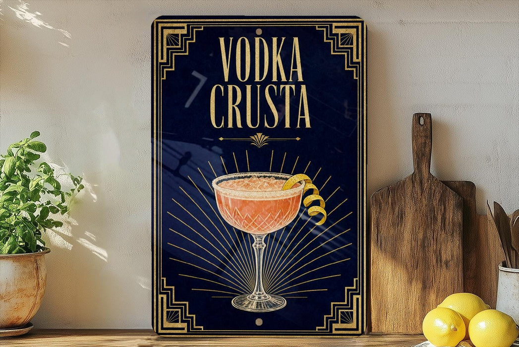 a decorative sign with a cocktail illustration, placed on a wooden surface next to a wooden cutting board and some lemons.