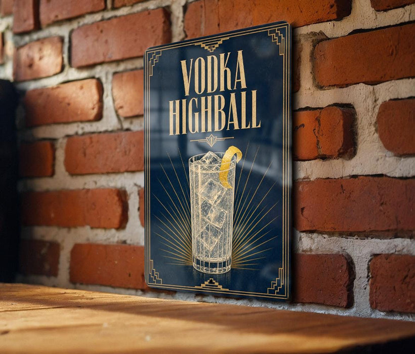 A sign with the text "VODKA HIGHBALL" and an illustration of a cocktail glass with ice and a lemon slice.