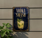 a sign that reads "VODKA SMASH" with a picture of a cocktail on it.