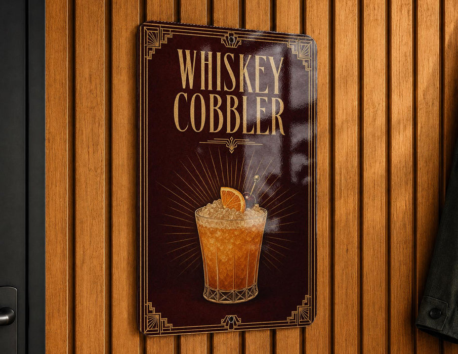 A sign for "Whiskey Cobler" is displayed on a wooden wall.