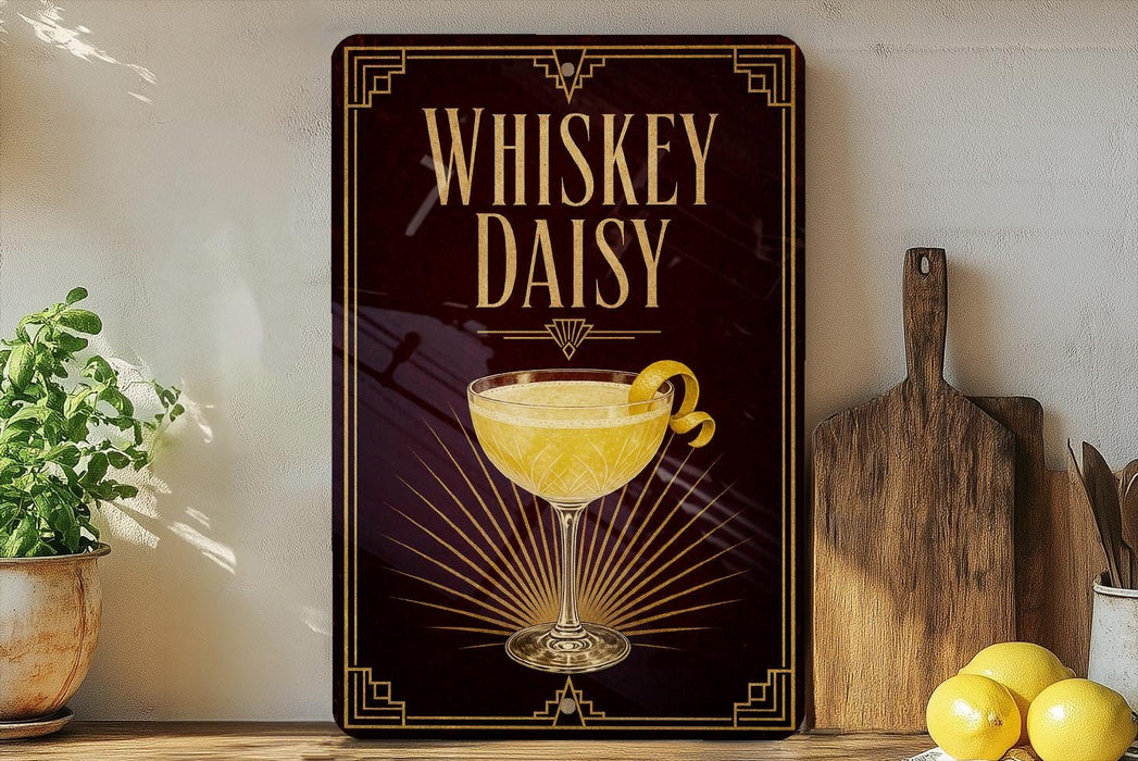 A decorative sign for whiskey daisy cocktail, featuring a glass of the cocktail and a lemon peel, is displayed on a shelf next to a wooden cutting board and a potted plant.