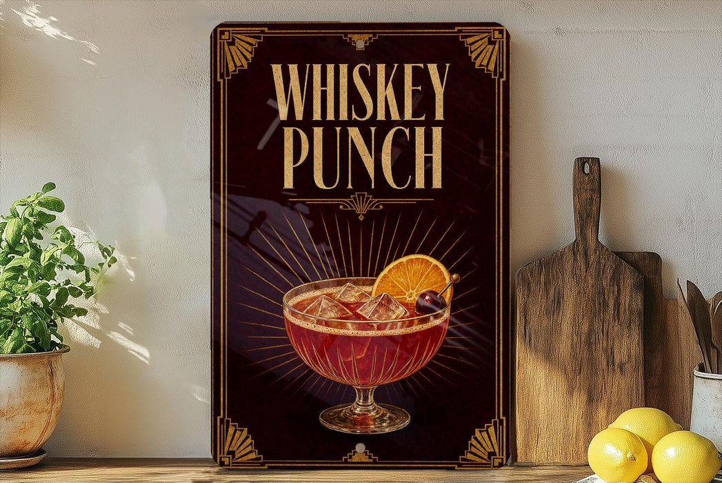 A framed poster with the text "WHISKEY PUNCH" and an illustration of a cocktail with a lemon slice.