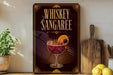 A decorative sign for a whiskey sangaree cocktail, featuring an illustration of a glass filled with the drink and garnished with an orange slice.