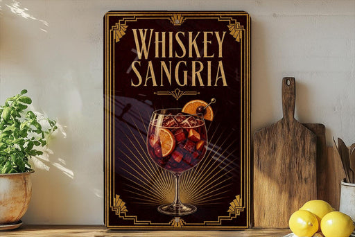 A framed advertisement for whiskey-sangria, featuring a glass of the cocktail with a garnish and a decorative border.