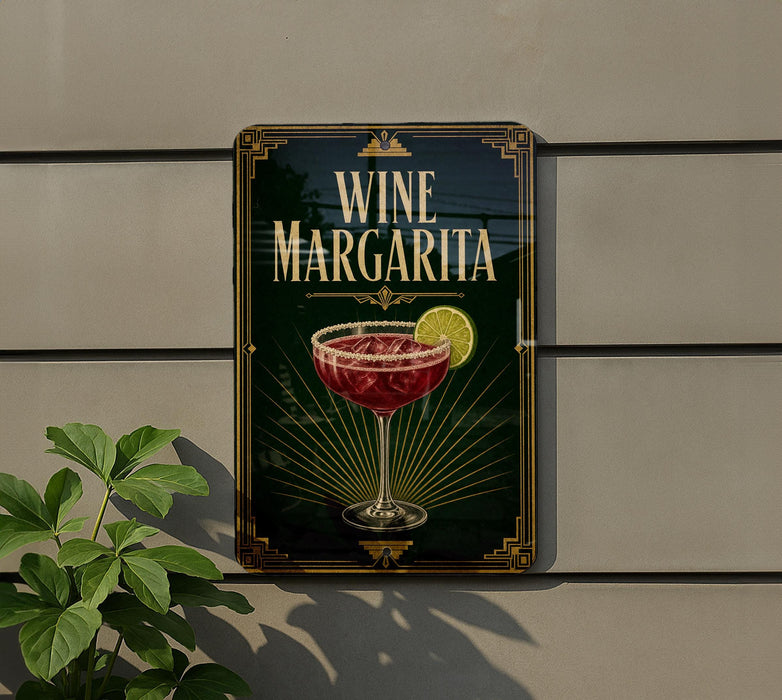 A sign for a wine margarita is displayed on a wall, featuring an illustration of a margarita glass with a slice of lime.