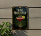 A sign for a wine margarita is displayed on a wall, featuring an illustration of a margarita glass with a slice of lime.