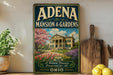 A vintage-style sign for "Adena Mansion & Gardens" in Ohio, featuring a large illustration of a historic mansion surrounded by a well-manicured garden.