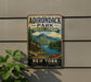 A vintage-style sign for Adirondack Park, New York, featuring a scenic landscape with a cabin, lake, and mountains.