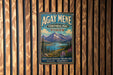 A vintage-style metal sign for Agay Mene Territorial Park in Yukon, Canada, featuring a scenic mountain landscape.