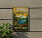 A vintage-style metal sign for Algonquin State Forest in Connecticut, featuring a scenic landscape with a lake, pine trees, and a red canoe.