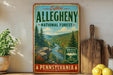 a vintage-style sign for Pennsylvania's Allegheny National Forest, with a scenic mountain landscape and a river.