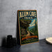 A vintage-style metal sign for the Alum Cave Trail in the Great Smoky Mountains National Park, featuring a scenic illustration of a rocky cliff and a winding path.