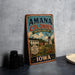 A vintage-style sign for the Amana Colonies in Iowa, featuring a windmill and a sign that says "Heritage Landscape".