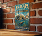 A vintage metal sign for the Anacapa Island State Marine Reserve in California, featuring an illustration of a rocky island, a seal, and a bird.