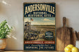 A vintage-style metal sign for the Andersonville National Historic Site in Georgia, featuring an illustration of a historical fort or structure with a cannon and a flag.
