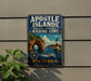 A vintage-style metal sign for the Apostle Islands National Lakeshore Marine Zone in Wisconsin, featuring a lighthouse, boats, and a scenic landscape.