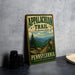 A vintage-style metal sign for the Appalachian Trail in Pennsylvania, featuring a scenic mountain landscape and the text "Appalachian Trail - The Adventure Awaits - Pennsylvania - Walk the Path, Embrace the Journey".