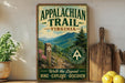 a vintage trail sign for the Appalachian Trail in Virginia, with a mountainous landscape and hiking trail markers.