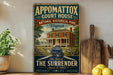 A vintage-style sign for Appomattox Court House, a National Historical Park in Virginia, featuring an illustration of a historic house with a banner that reads "The Site of the Surrender".