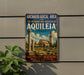 a vintage-style sign advertising the Archaeological Area and the Patriarchal Basilica of Aquileia, Italy.