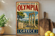 a vintage-style poster of the Archaeological Site of Olympia, Greece, with a depiction of the ancient ruins and columns.