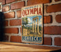 a vintage-style poster of the ancient Greek city of Olympia, with the text "ARCHAEOLOGICAL SITE OF OLYMPIA" and "GREECE" prominently displayed.