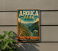 A vintage-style metal sign for Arouca Park in Portugal, featuring a scenic mountain landscape with a suspension bridge.