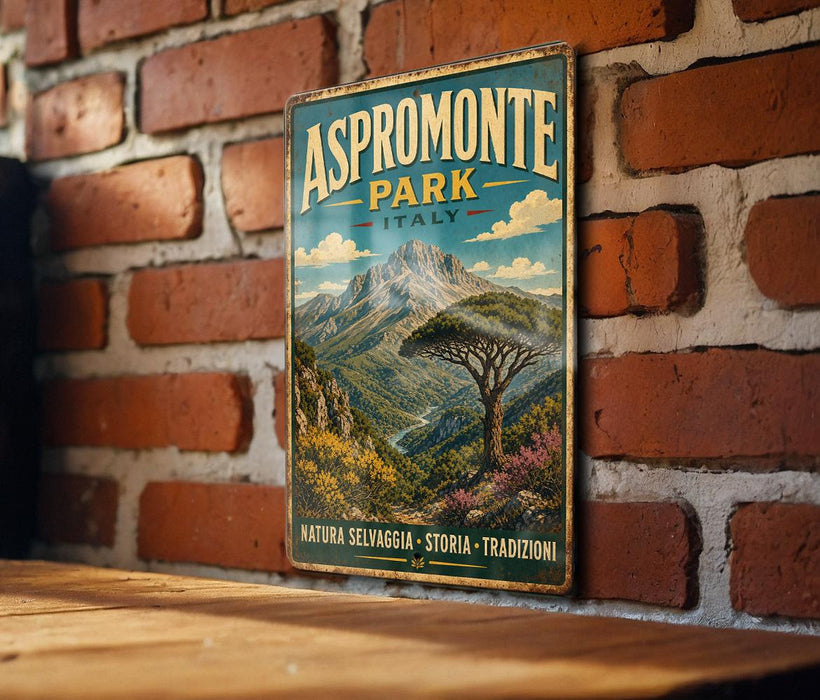 A vintage-style metal sign for Aspromonte Park in Italy, featuring a mountain landscape and a tree, is displayed on a brick wall.