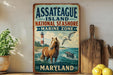A vintage-style metal sign for Assateague Island National Seashore, Maryland, featuring a horse, seagull, and lighthouse in the background.