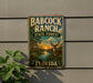 A vintage metal sign for Babcock Ranch, Florida, featuring a scenic landscape with a deer and palm trees.