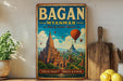 A vintage-style travel poster for Bagan, Myanmar, featuring a temple surrounded by hot air balloons and the text "Bagan MYANMAR Land of Ancient Wonders".