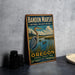 A vintage metal sign for Bandon Marsh National Wildlife Refuge in Oregon, featuring a large heron and a scenic landscape.