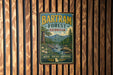 A vintage-style metal sign for Bartram Forest in Georgia, featuring a scenic landscape with mountains, trees, and a river.