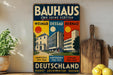 a vintage Bauhaus poster advertising the Bauhaus design school in Weimar, Bernau, and Deutschland.