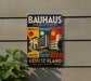 a vintage Bauhaus poster advertising the Bauhaus school in Germany.