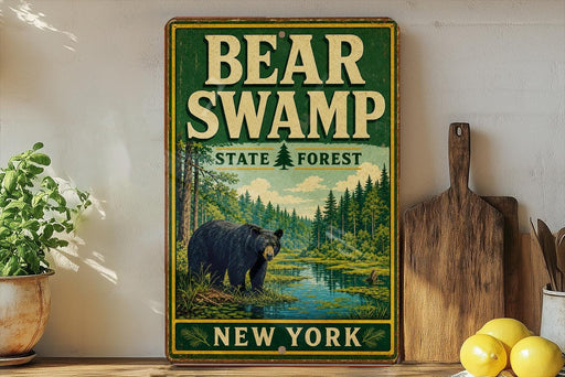 A vintage-style sign for Bear Swamp State Forest in New York, featuring a black bear in a forest setting.