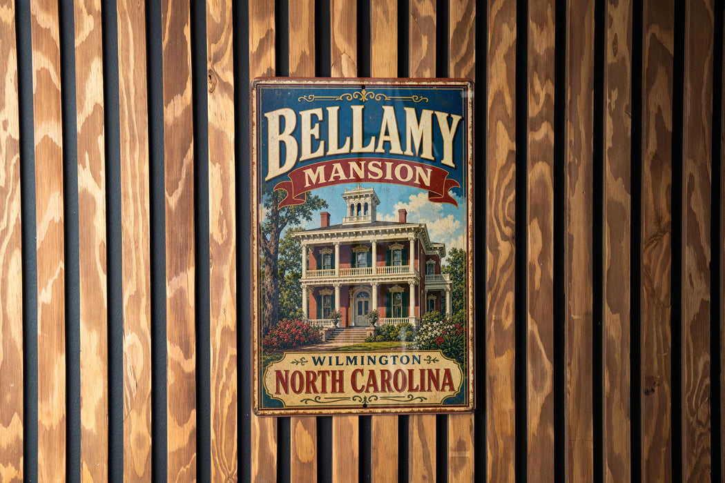 A vintage-style sign for Bellamy mansion in Winston-Salem, North Carolina, featuring an illustration of the mansion and the text "Bellamy mansion" prominently displayed.