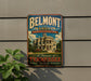 A vintage-style metal sign for Belmont Mansion in Nashville, Tennessee, featuring an illustration of the mansion and the text "Belmont Mansion, Nashville's Grande Dame, A Treasure of Tennessee, History, Heritage, Elegance".