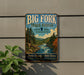 A vintage-style metal sign for Big Fork State Forest in Minnesota, featuring a scenic landscape with a river and pine trees.