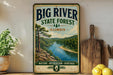 A vintage-style sign for the Big River State Forest in Illinois, featuring a scenic illustration of a river surrounded by lush greenery.