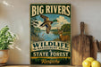 A vintage-style sign for the Big Rivers Wildlife Management Area in Kentucky, featuring a duck and deer in a natural setting.