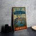 A vintage-style metal sign for the Bitter Lake National Wildlife Refuge in New Mexico, featuring an illustration of a heron and ducks in a lake.