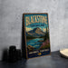 A vintage-style sign for Blackstone Territorial Park, featuring a mountain landscape and a river, is displayed on a gray wall.