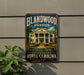 A vintage-style sign for the Blandwood Mansion, a historic mansion located in Greensboro, North Carolina.
