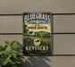 A vintage-style sign for the Bluegrass Cultural Landscape of the Inner South in Kentucky, featuring a horse, flowers, and a farm scene.