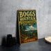 A vintage metal sign for Boggs Mountain, a demonstration state forest in California, featuring a scenic landscape with a mountain, trees, and a lake.