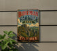 A vintage-style metal sign for Bohemian Paradise Park in Czechia, featuring a scenic landscape with mountains and trees.